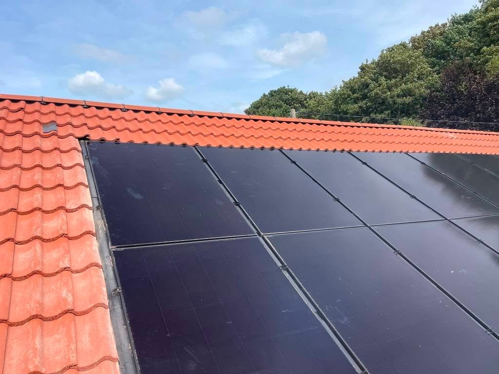Completed re-roof with solar panel installation