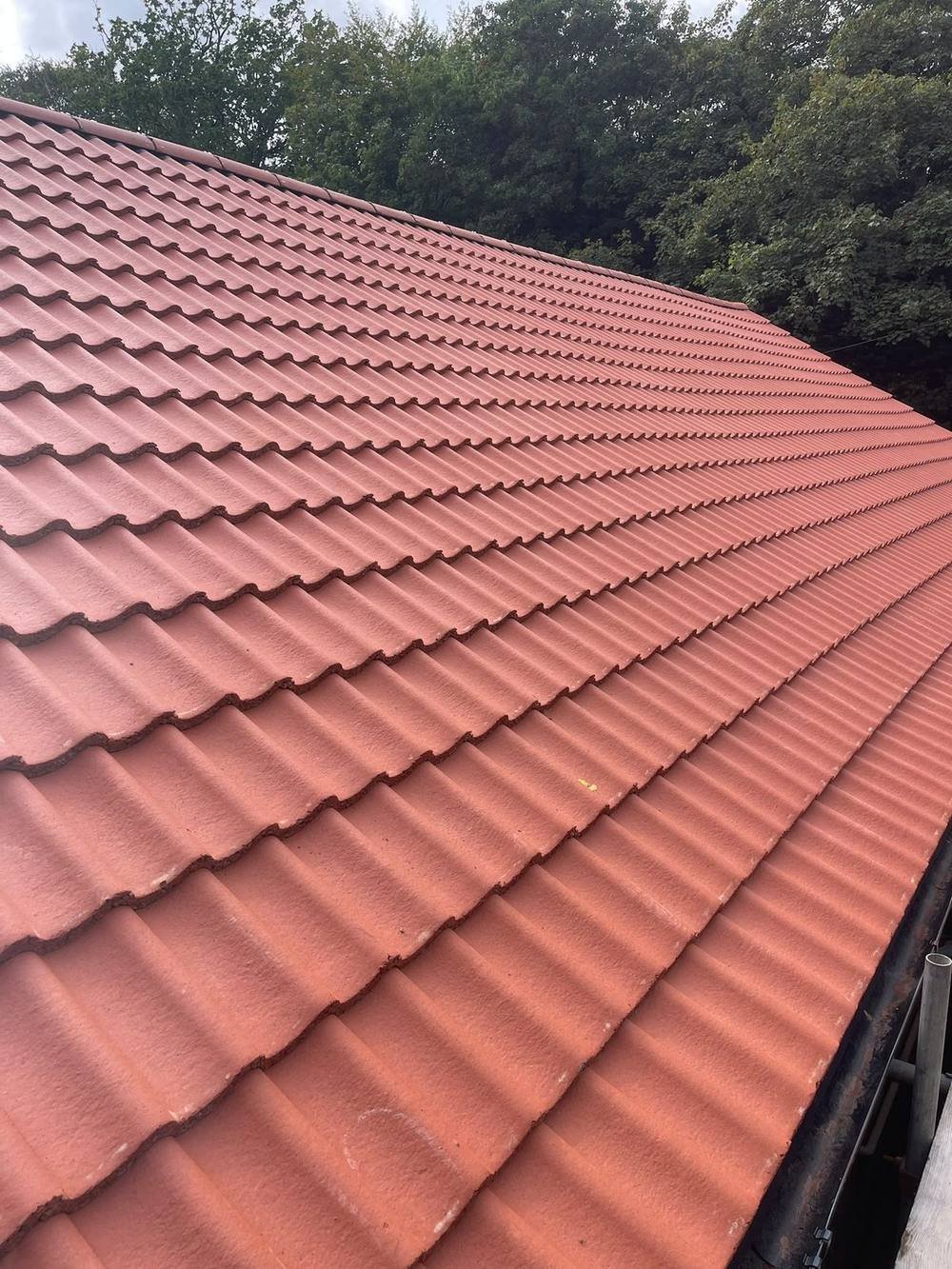 Newly installed pitched tile roof